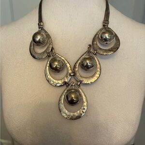 Beautiful silver statement necklace.